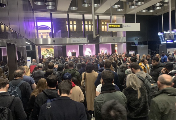 People at Tottenham Court Road tube station